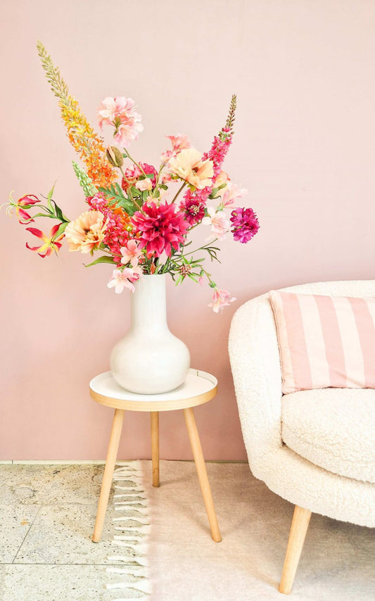 groot zijden boeket met vrolijke kleuren roze, oranje bloemen